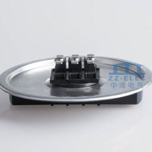 Three-phase capacitors buckle cover