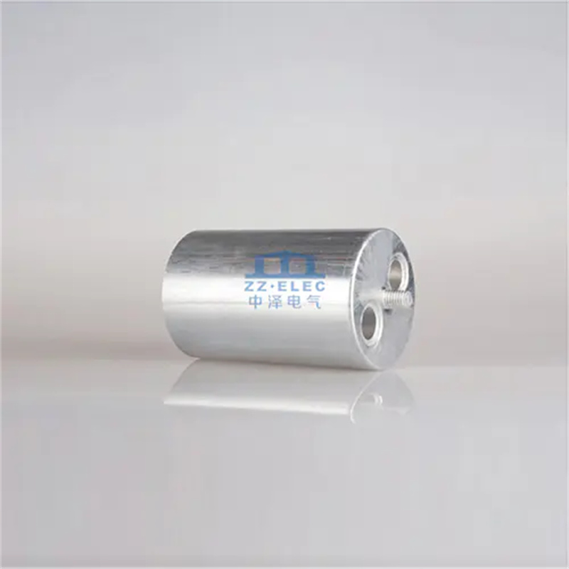 Capacitor Case With Perforated Bottom